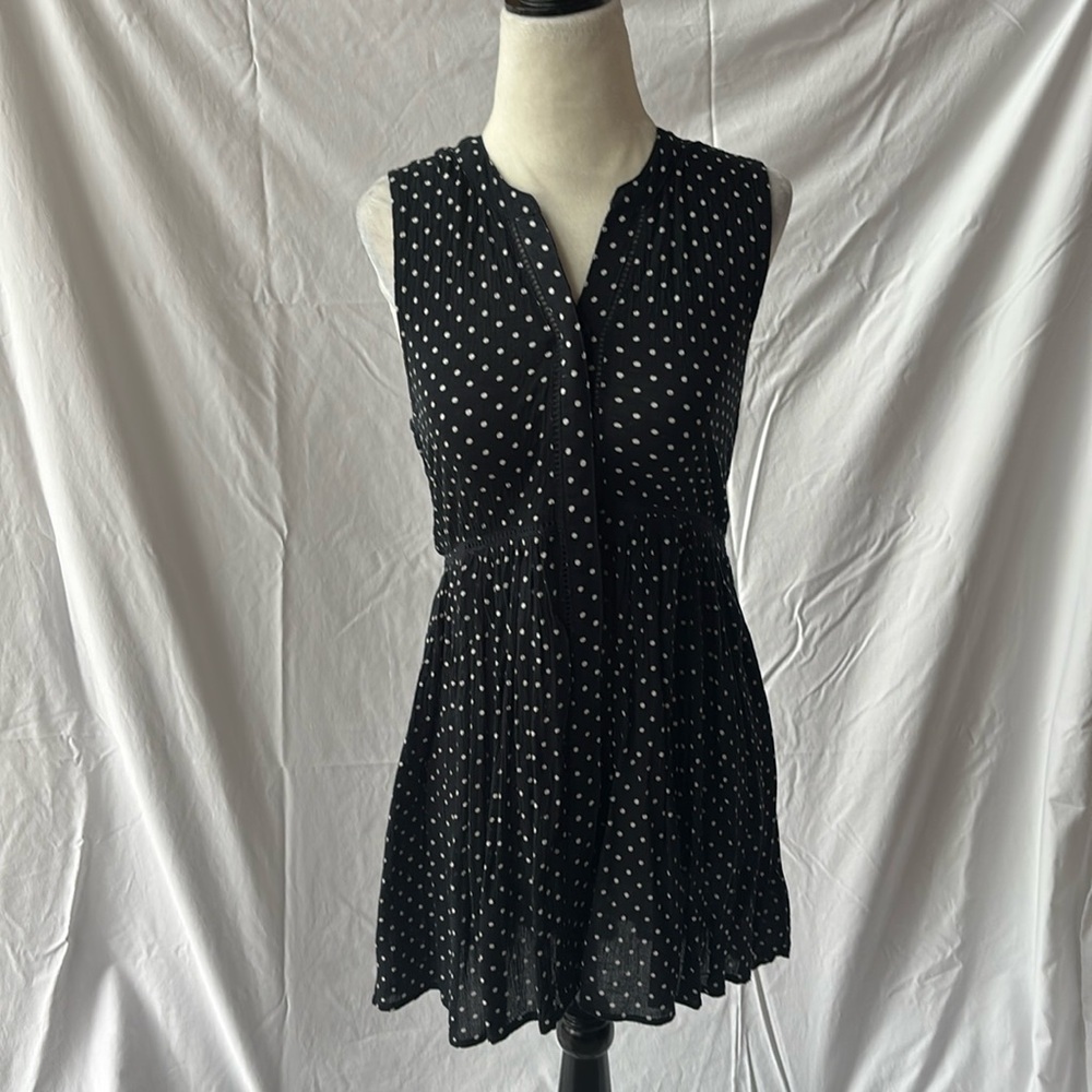 Anthropologie button up tunic. Color is dark navy, could pass for Black.